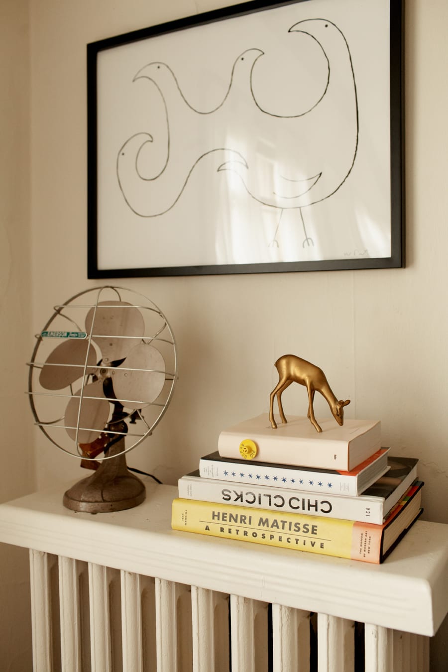 framed drawing fan books living room kate arends wit & delight