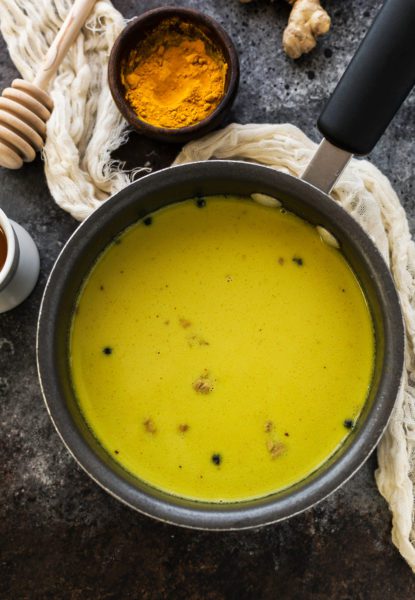 golden milk in a pot turmeric wit & delight