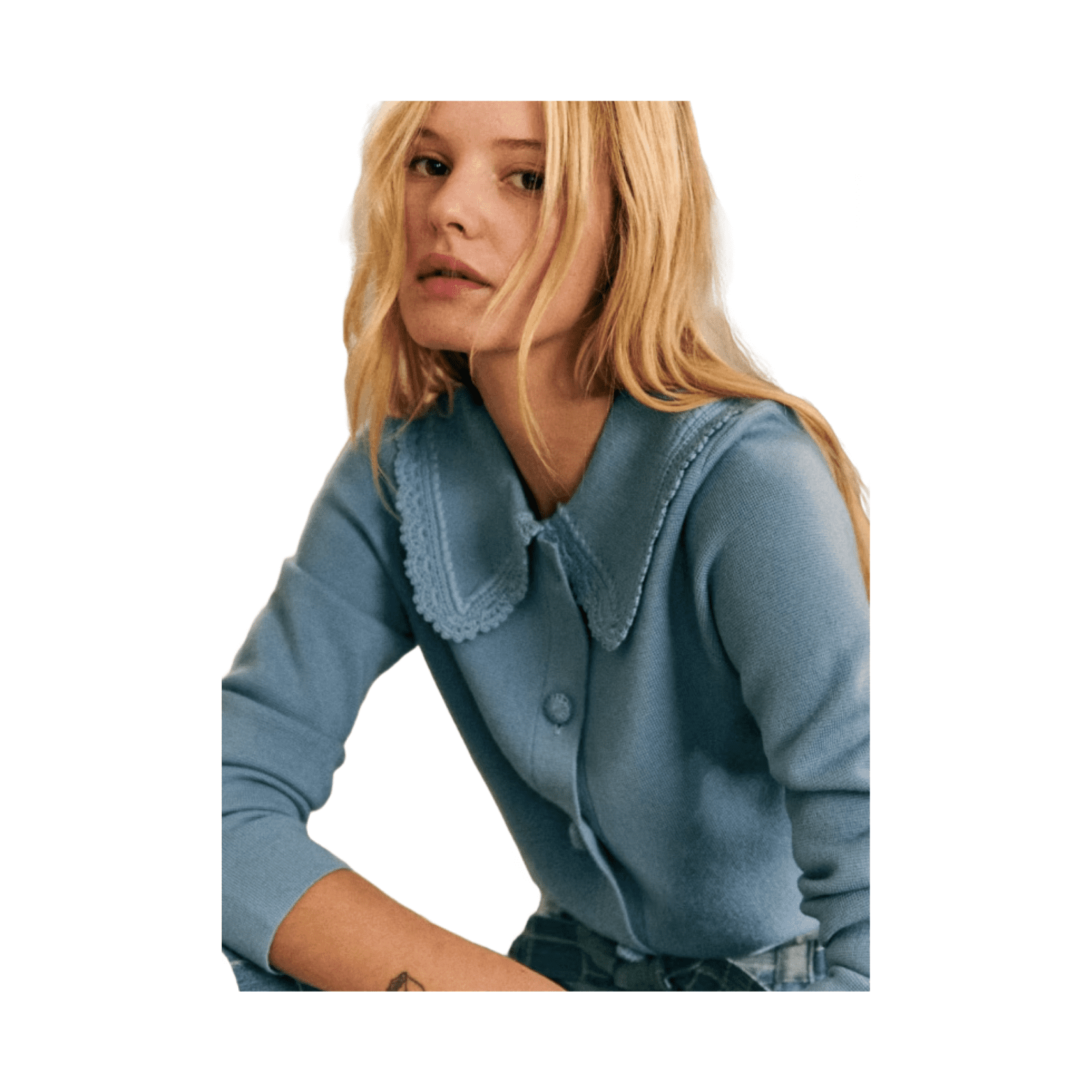 woman wearing a powder blue button up cardigan