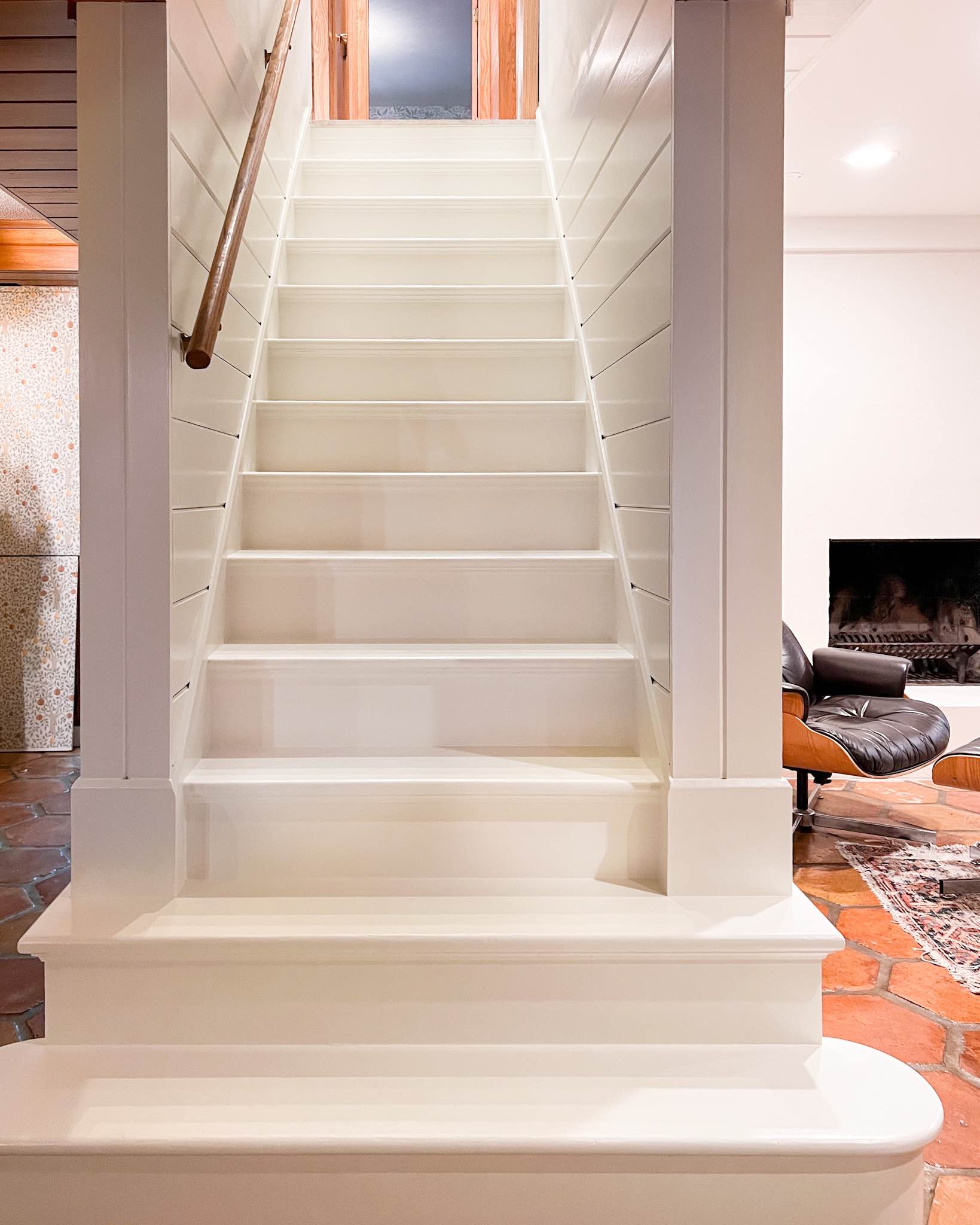 White-Painted Stairs Made A Big Difference in Our Basement